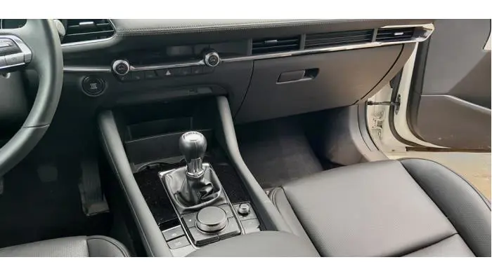 Przycisk I-Drive Mazda 3.